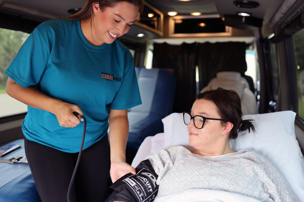 Nurse With Patient On Long Distance Medical Transport