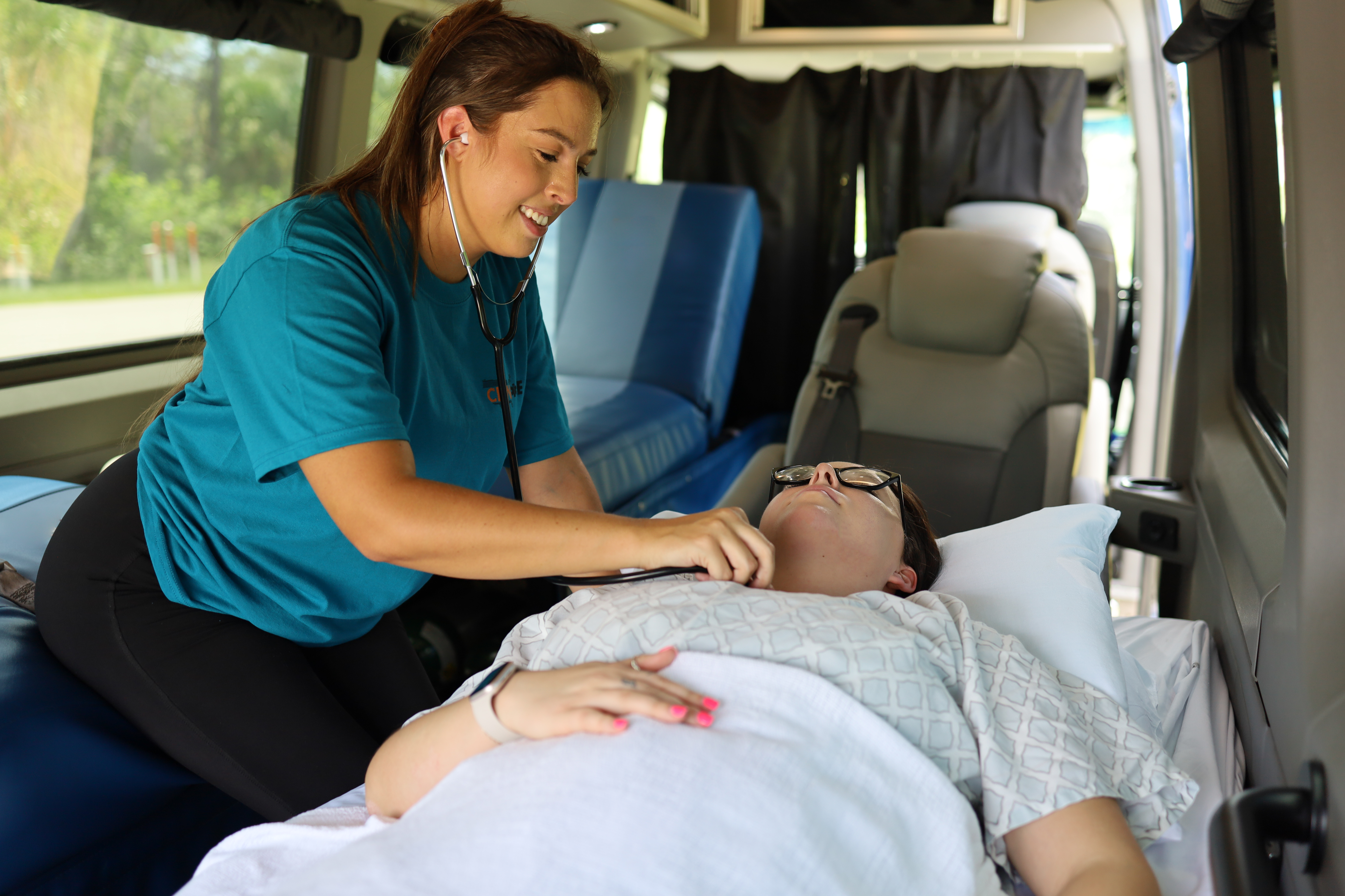 Nurse with Patient On Long Distance Medical Transport