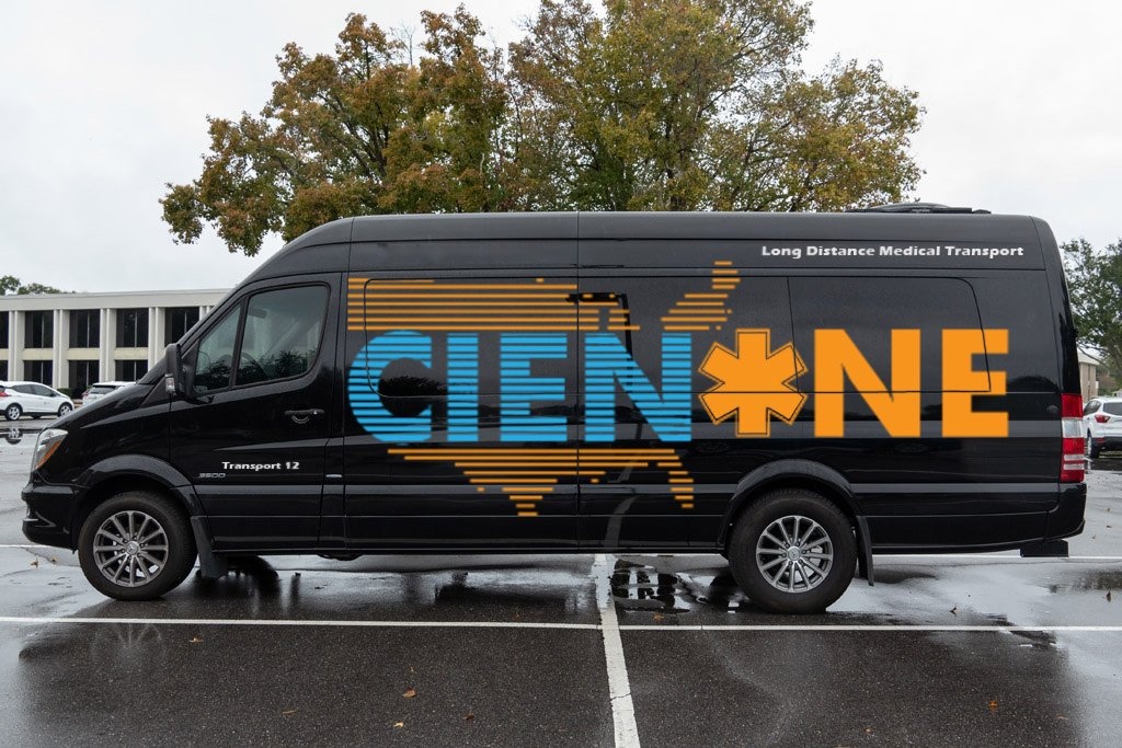 CienOne long-distance medical transport van, a black Mercedes-Benz Sprinter with the CienOne logo